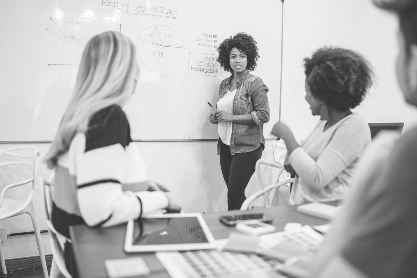 Collaborative venture building session with participants working on business strategy